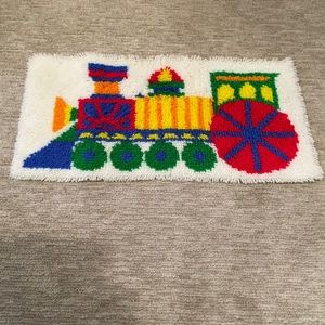 Vintage latch hooked Rug of train in primary colors